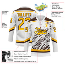 Laden Sie das Bild in den Galerie-Viewer, Custom White Gold-Brown 3D Splash Art Hockey Lace Neck Jersey