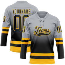 Laden Sie das Bild in den Galerie-Viewer, Custom Gray Black-Gold Fade Fashion Hockey Lace Neck Jersey