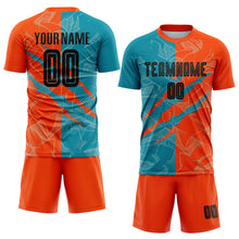 Laden Sie das Bild in den Galerie-Viewer, Custom Graffiti Pattern Black Teal-Orange Scratch Sublimation Soccer Uniform Jersey