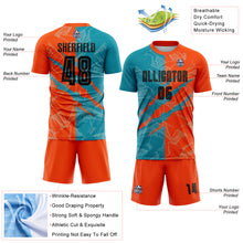 Laden Sie das Bild in den Galerie-Viewer, Custom Graffiti Pattern Black Teal-Orange Scratch Sublimation Soccer Uniform Jersey