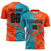 Laden Sie das Bild in den Galerie-Viewer, Custom Graffiti Pattern Black Teal-Orange Scratch Sublimation Soccer Uniform Jersey