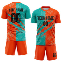 Laden Sie das Bild in den Galerie-Viewer, Custom Graffiti Pattern Black Aqua-Orange Scratch Sublimation Soccer Uniform Jersey