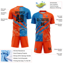 Laden Sie das Bild in den Galerie-Viewer, Custom Graffiti Pattern Black Blue-Orange Scratch Sublimation Soccer Uniform Jersey