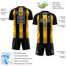 Laden Sie das Bild in den Galerie-Viewer, Custom Black Gold-White Line Sublimation Soccer Uniform Jersey