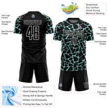Laden Sie das Bild in den Galerie-Viewer, Custom Black Ice Blue-White Abstract Network Splash Sublimation Soccer Uniform Jersey