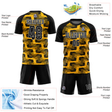 Laden Sie das Bild in den Galerie-Viewer, Custom Black Gold-White Line Sublimation Soccer Uniform Jersey
