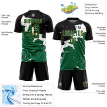Laden Sie das Bild in den Galerie-Viewer, Custom Black Kelly Green-Old Gold Splash Sublimation Soccer Uniform Jersey