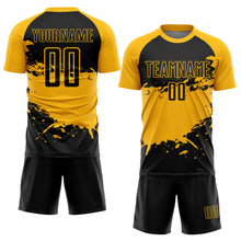 Laden Sie das Bild in den Galerie-Viewer, Custom Black Gold Splash Sublimation Soccer Uniform Jersey