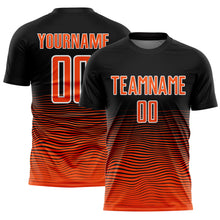 Laden Sie das Bild in den Galerie-Viewer, Custom Black Orange-White Gradient Line Sublimation Soccer Uniform Jersey