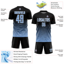Laden Sie das Bild in den Galerie-Viewer, Custom Black Light Blue-White Gradient Line Sublimation Soccer Uniform Jersey