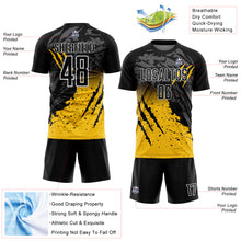 Загрузить изображение в средство просмотра галереи, Custom Black Yellow-White Gradient Scratch Splash Sublimation Soccer Uniform Jersey