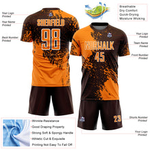Laden Sie das Bild in den Galerie-Viewer, Custom Brown Bay Orange-White Abstract Brush Stroke Sports Sublimation Soccer Uniform Jersey