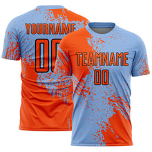 Load image into Gallery viewer, Custom Light Blue Orange-Black Abstract Brush Stroke Sports Sublimation Soccer Uniform Jersey