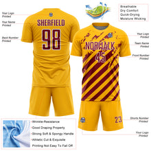 Laden Sie das Bild in den Galerie-Viewer, Custom Gold Crimson-White Distressed Diagonal Stripe Pattern Sports Sublimation Soccer Uniform Jersey