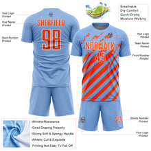 Load image into Gallery viewer, Custom Light Blue Orange-White Distressed Diagonal Stripe Pattern Sports Sublimation Soccer Uniform Jersey