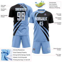 Laden Sie das Bild in den Galerie-Viewer, Custom Light Blue White-Black Diagonal Streamline Color Block Swirl Curve Lines Sublimation Soccer Uniform Jersey