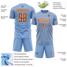 Load image into Gallery viewer, Custom Light Blue Texas Orange-Cream Curve Lines Sublimation Soccer Uniform Jersey