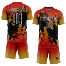 Load image into Gallery viewer, Custom Red Black Old Gold-White Gradient Splash Sublimation Soccer Uniform Jersey