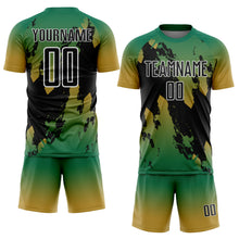 Laden Sie das Bild in den Galerie-Viewer, Custom Kelly Green Black Old Gold-White Gradient Splash Sublimation Soccer Uniform Jersey