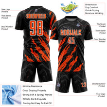 Charger l'image dans la galerie, Custom Black Orange-White Brush Stroke Splatter Liquid Swirl Sublimation Soccer Uniform Jersey