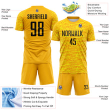 Charger l'image dans la galerie, Custom Gold-Black Distressed Fragment Brush Stroke Sublimation Soccer Uniform Jersey