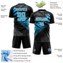Laden Sie das Bild in den Galerie-Viewer, Custom Black Sky Blue-White Grunge Splatter Brush Stroke Sublimation Soccer Uniform Jersey