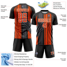 Laden Sie das Bild in den Galerie-Viewer, Custom Black Orange-White Brush Stroke Fluid Stripes Sublimation Soccer Uniform Jersey