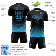 Laden Sie das Bild in den Galerie-Viewer, Custom Black-Sky Blue Fade Wave Lines Splatter Sublimation Soccer Uniform Jersey
