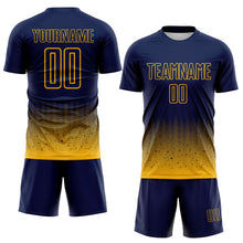 Laden Sie das Bild in den Galerie-Viewer, Custom Navy-Gold Fade Wave Lines Splatter Sublimation Soccer Uniform Jersey