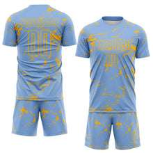 Laden Sie das Bild in den Galerie-Viewer, Custom Light Blue-Gold Abstract Fluid Marble Sublimation Soccer Uniform Jersey
