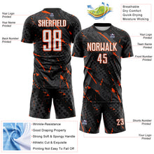 Laden Sie das Bild in den Galerie-Viewer, Custom Black White Orange-Gray Brush Stroke Slashes And Dot Grid Sublimation Soccer Uniform Jersey