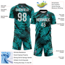 Load image into Gallery viewer, Custom Aqua White-Black Abstract Swirl Wave Grunge Splatter Sublimation Soccer Uniform Jersey