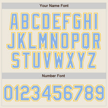 Laden Sie das Bild in den Galerie-Viewer, Custom Cream Light Blue White-Gold Authentic Two Tone Baseball Jersey