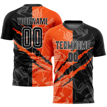 Laden Sie das Bild in den Galerie-Viewer, Custom Graffiti Pattern Black-Orange Scratch Sublimation Soccer Uniform Jersey