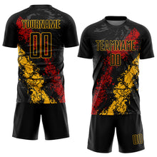 Laden Sie das Bild in den Galerie-Viewer, Custom Black Gold-Red Sublimation Soccer Uniform Jersey