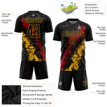 Laden Sie das Bild in den Galerie-Viewer, Custom Black Gold-Red Sublimation Soccer Uniform Jersey