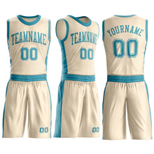 Laden Sie das Bild in den Galerie-Viewer, Custom Cream Teal Round Neck Suit Basketball Jersey
