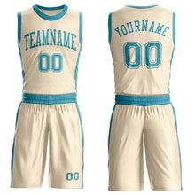 Laden Sie das Bild in den Galerie-Viewer, Custom Cream Teal Round Neck Suit Basketball Jersey
