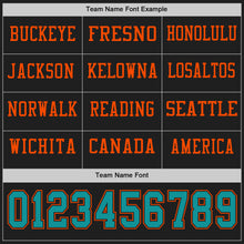 Load image into Gallery viewer, Custom Black Teal-Orange Long Sleeve Authentic Football Jersey

