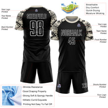 Laden Sie das Bild in den Galerie-Viewer, Custom Black Cream-White Snake Skin Sublimation Soccer Uniform Jersey
