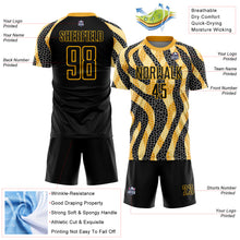 Laden Sie das Bild in den Galerie-Viewer, Custom Black Gold Animal Print Sublimation Soccer Uniform Jersey
