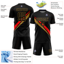 Laden Sie das Bild in den Galerie-Viewer, Custom Black Red-Old Gold Diagonal Lines Sublimation Soccer Uniform Jersey
