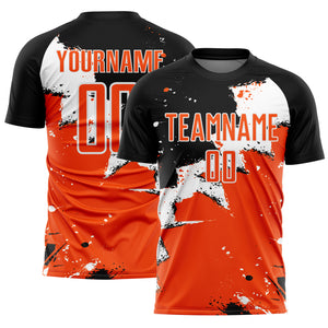 Custom Black Orange-White Splash Sublimation Soccer Uniform Jersey