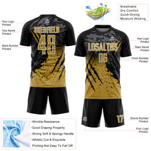 Load image into Gallery viewer, Custom Black Old Gold-White Gradient Scratch Splash Sublimation Soccer Uniform Jersey
