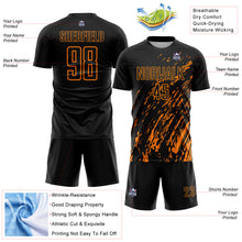 Laden Sie das Bild in den Galerie-Viewer, Custom Black Bay Orange Splash Sublimation Soccer Uniform Jersey
