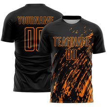 Laden Sie das Bild in den Galerie-Viewer, Custom Black Bay Orange Splash Sublimation Soccer Uniform Jersey
