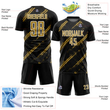 Load image into Gallery viewer, Custom Black Old Gold-White Abstract Fragment Art Splash Sublimation Soccer Uniform Jersey
