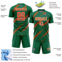Load image into Gallery viewer, Custom Kelly Green Orange-White Abstract Fragment Art Splash Sublimation Soccer Uniform Jersey

