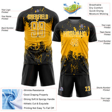 Laden Sie das Bild in den Galerie-Viewer, Custom Black Gold-White Abstract Splatter Grunge Art Sports Sublimation Soccer Uniform Jersey

