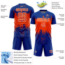 Laden Sie das Bild in den Galerie-Viewer, Custom Royal Orange-White Abstract Splatter Grunge Art Sports Sublimation Soccer Uniform Jersey
